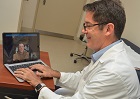MHS provider engaged in a virtual health care encounter