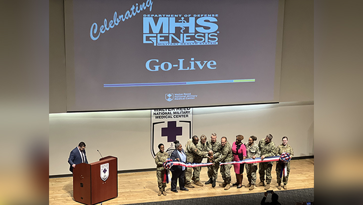 Walter Reed National Military Medical Center (WRNMMC) leadership, MHS GENESIS team members, and staff cut the ribbon welcoming MHS GENESIS during a ribbon-cutting ceremony, March 25, 2023. (Photo By Rick McNamara)