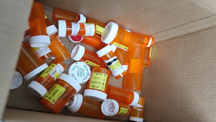 Image of Photo of empty pill bottles.