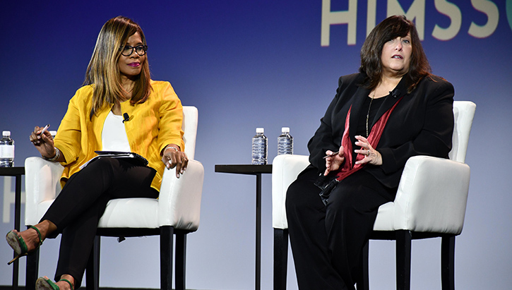 Image of Dr. Terry Adirim, acting assistant secretary of defense for health affairs, right, speaks during a panel discussion.