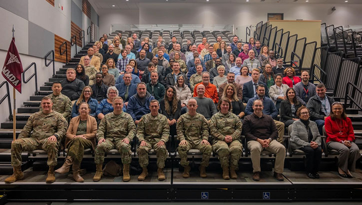 Team members with the U.S. Army Medical Materiel Development Activity gather for a group photo on Dec. 6, 2023.  (U.S. Army Photo by Cameron E. Parks)