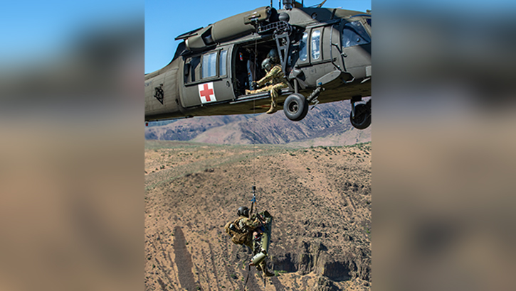 A flight medic assigned to U.S. Army Air Ambulance Detachment-Yakima, 16th Combat Aviation Brigade, is lifted by a hoist on a Black Hawk helicopter on June 5 near Oak Creek Wildlife Area in Washington.  (Photo: U.S. Army Capt. Kyle Abraham)