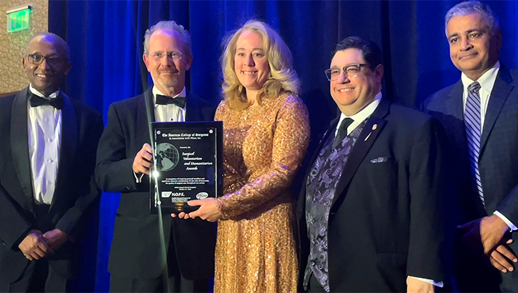 U.S. Air Force Col. (Dr.) Kerry P. Latham (center) accepted the American College of Surgeons/Pfizer Military Surgical Volunteerism Award during the annual ACS Clinical Congress in Boston, Oct. 22-26, 2023. (Photo by U.S. Army Col. Danielle Holt)