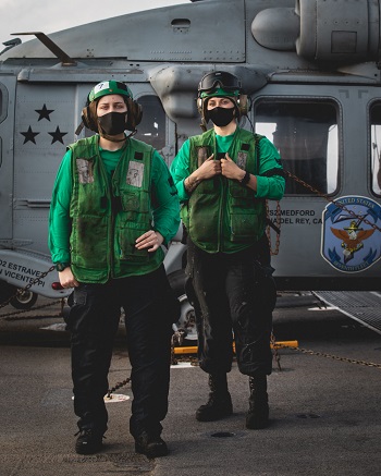 Military health personnel wearing face masks posing for a picture