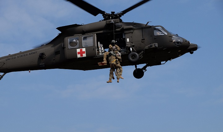 Soldiers from the 7th Mission Support Command, Medical Support Unit-Europe conduct medical evacuation training with Staff Sgt. Jessie Turner, flight medic with the 1st Armored Division's Combat Aviation Brigade. (U.S. Army photo by Sgt. 1st Class Matthew Chlosta)