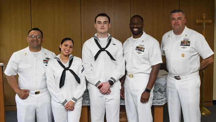 Sailors pose for a photo during Surgical Technology Program graduation
