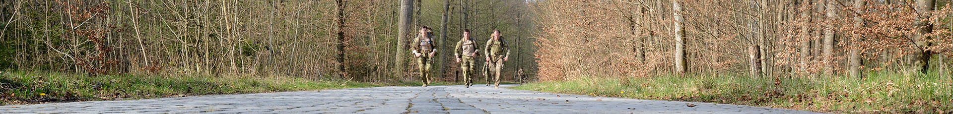 U.S. Soldiers assigned to 1st Battalion, 10th Special Forces Group (Airborne), participate in a ruck march in which they were required to carry a minimum of 40 pounds though an 18-mile course. The participants were allowed 4.5 hours to complete the course which brought them through the Boeblingen Local Training Area in Boeblingen, Germany, April 17, 2015. (U.S. Army photo by Visual Information Specialist Jason Johnston/Released)