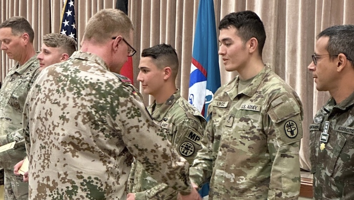 Military personnel at badge ceremony